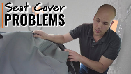 Sheldon putting on a seat cover with "seat cover problems" written on top
