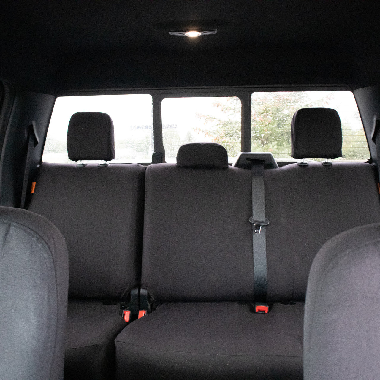 Ford rear seat with TigerTough Black Cordura seat covers.