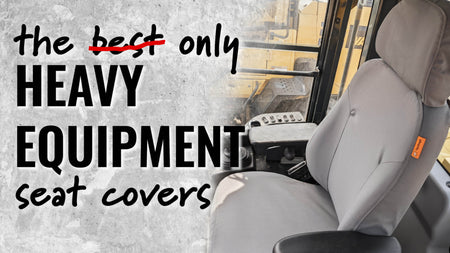 Inside of the cab of heavy equipment with a TigerTough seat cover on it. Text overlay reading: the only heavy equipment seat covers