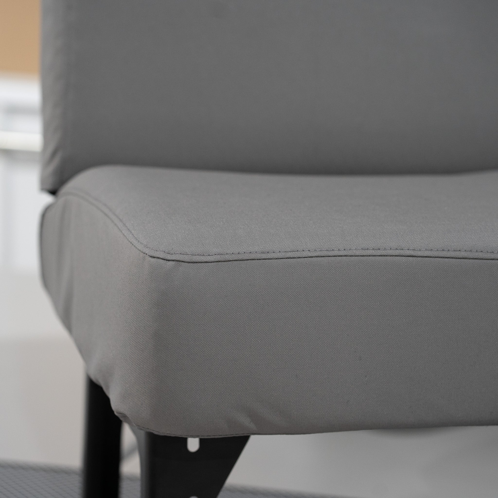 This picture shows the seam detail on the seat cover for a Hino passenger bench.