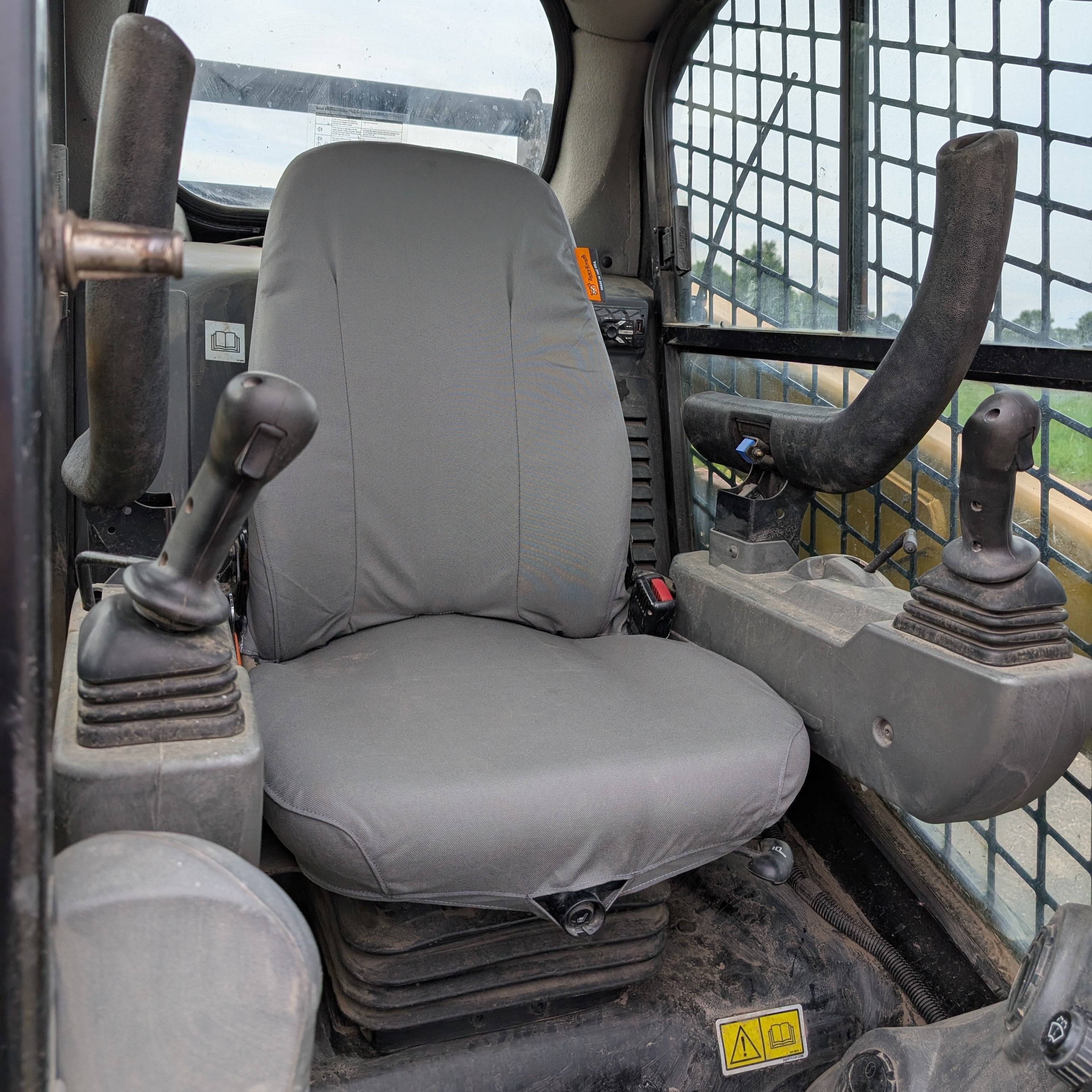 CAT D-Series Skid Loader Seat Cover - Suspension Seat (E0822035)