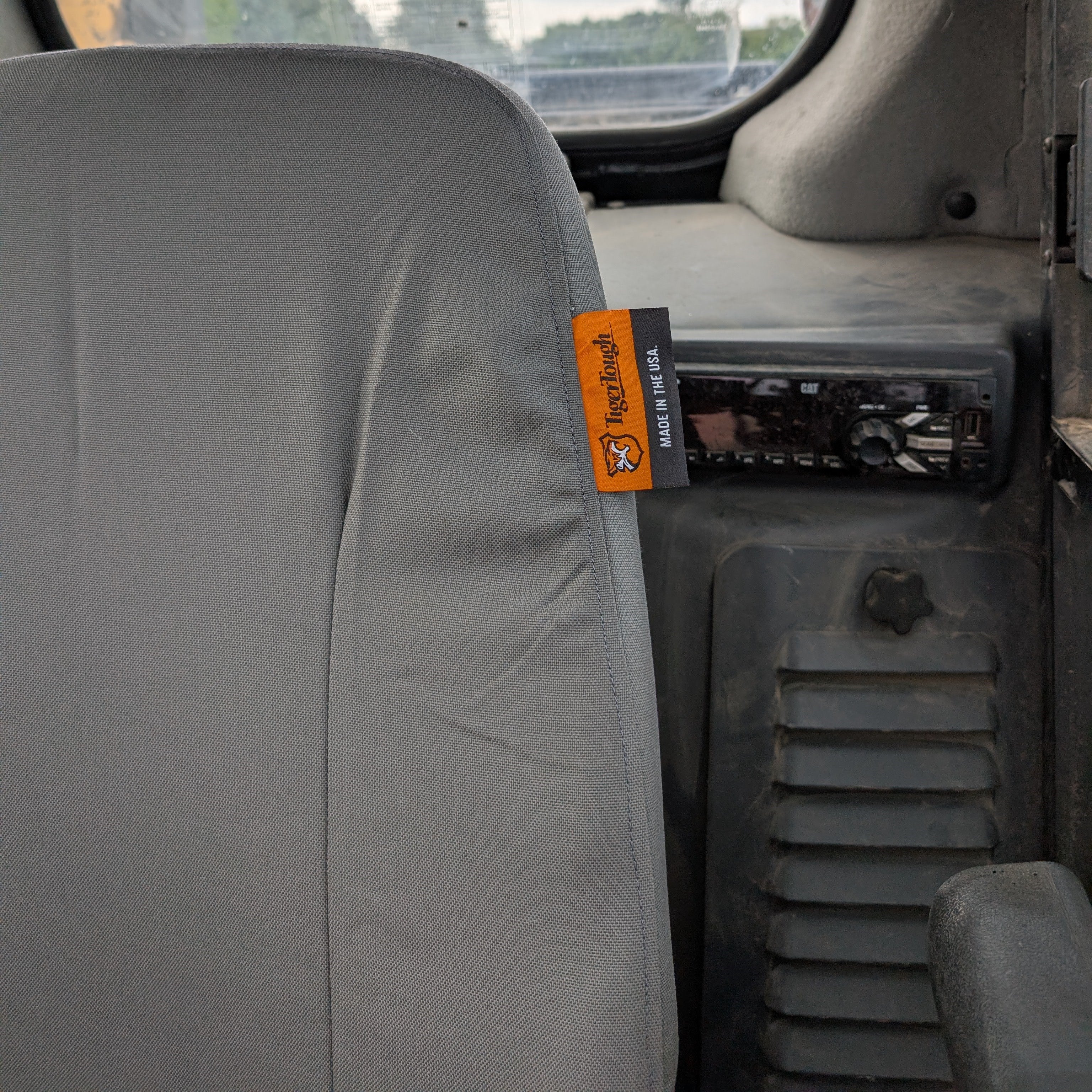 CAT D-Series Skid Loader Seat Cover - Suspension Seat (E0822035)