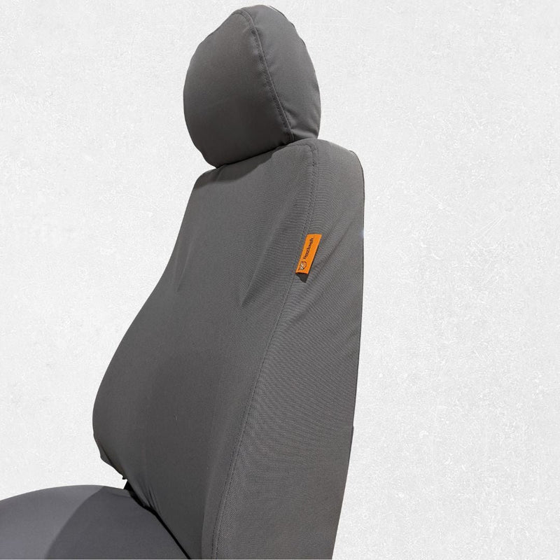 Komatsu excavator seat with gray TigerTough seat cover, side detail
