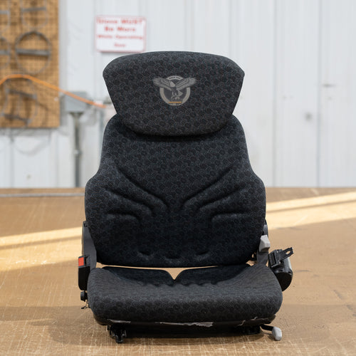 A picture of the equipment seat without the seat cover