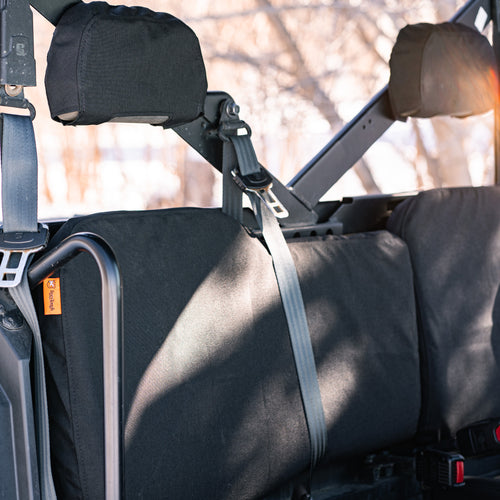 TigerTough seat covers for side-by-sides also include the headrest covers whenever there's headrests on the machine. Each ATV/UTV seat cover is designed specifically for that seat.