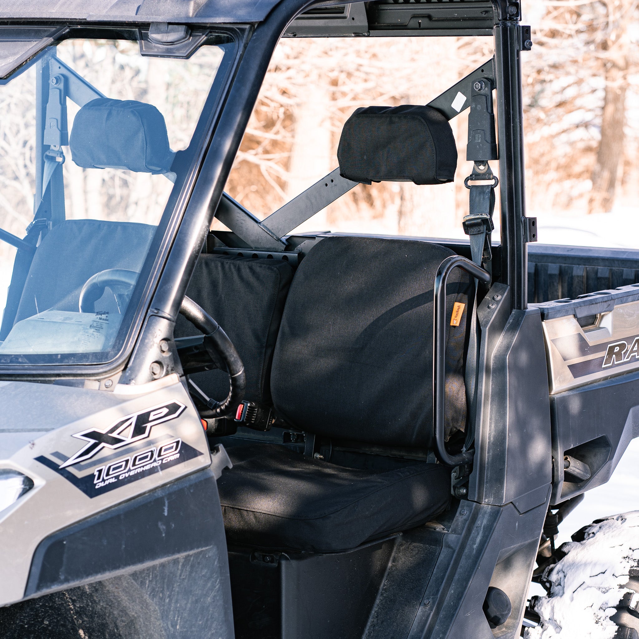 TigerTough Seat Covers in a Polaris Ranger side-by-side. TigerTough has seat covers for common side-by-sides, ATVs, and UTVs to protect their seats from the elements and the wear and tear of hard use.