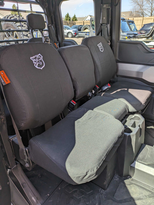 TigerTough Seat Covers in a Polaris Ranger side-by-side. TigerTough has seat covers for common side-by-sides, ATVs, and UTVs to protect their seats from the elements and the wear and tear of hard use.