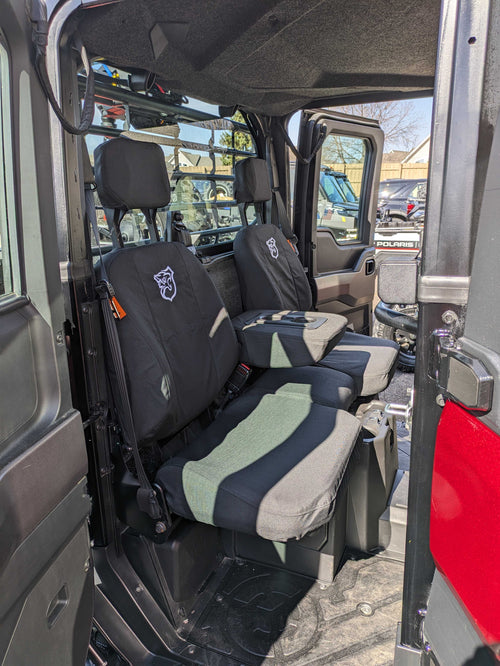 TigerTough Seat Covers in a Polaris Ranger side-by-side. TigerTough has seat covers for common side-by-sides, ATVs, and UTVs to protect their seats from the elements and the wear and tear of hard use.