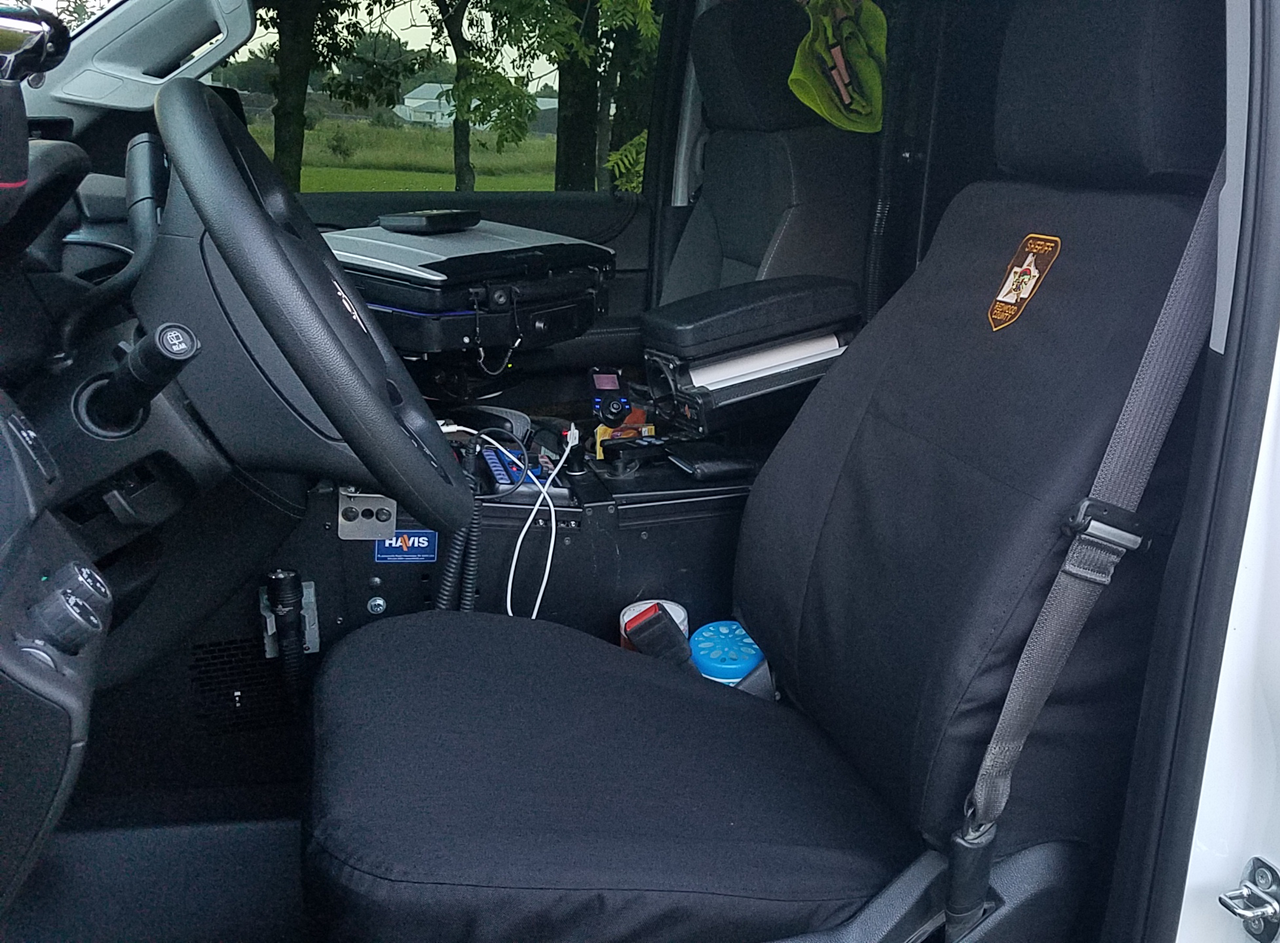 Chevy Tahoe with black TigerTough Tactical police specific seat covers.