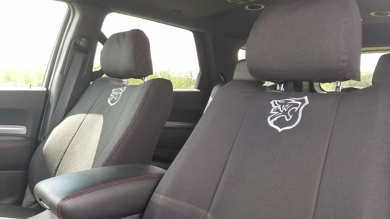 Dodge Durango with black TigerTough Tactical seat covers. Shown with optional custom embroidery.