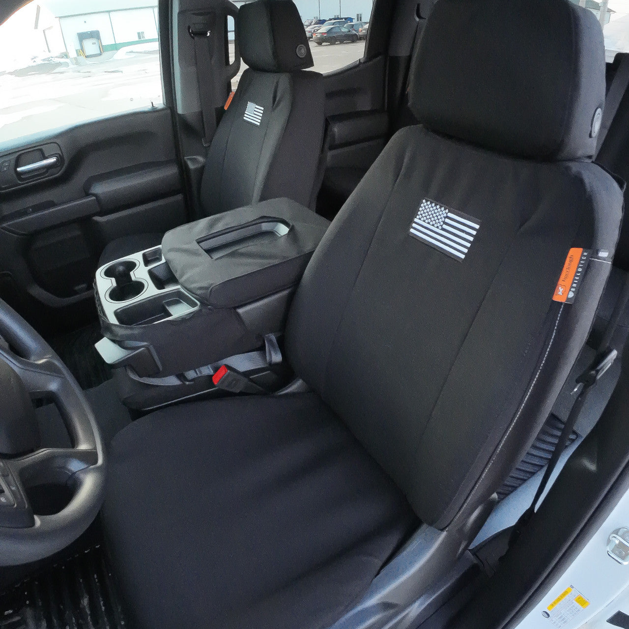 Front Seat of a 2019 Chevy Silverado 1500 with Black TigerTough Seat Covers