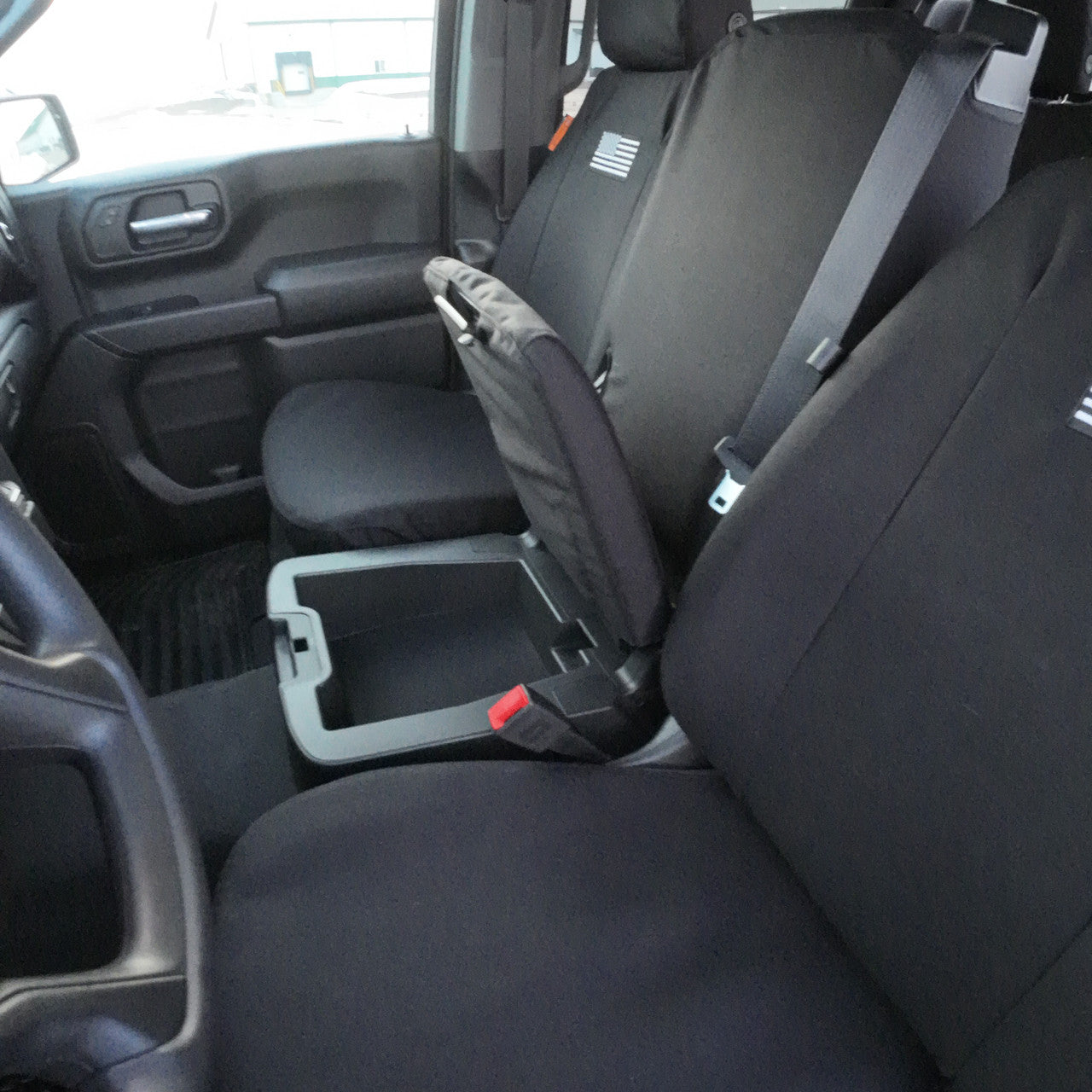 Front Seat of a 2019 Chevy Silverado 1500 with Black TigerTough Seat Covers