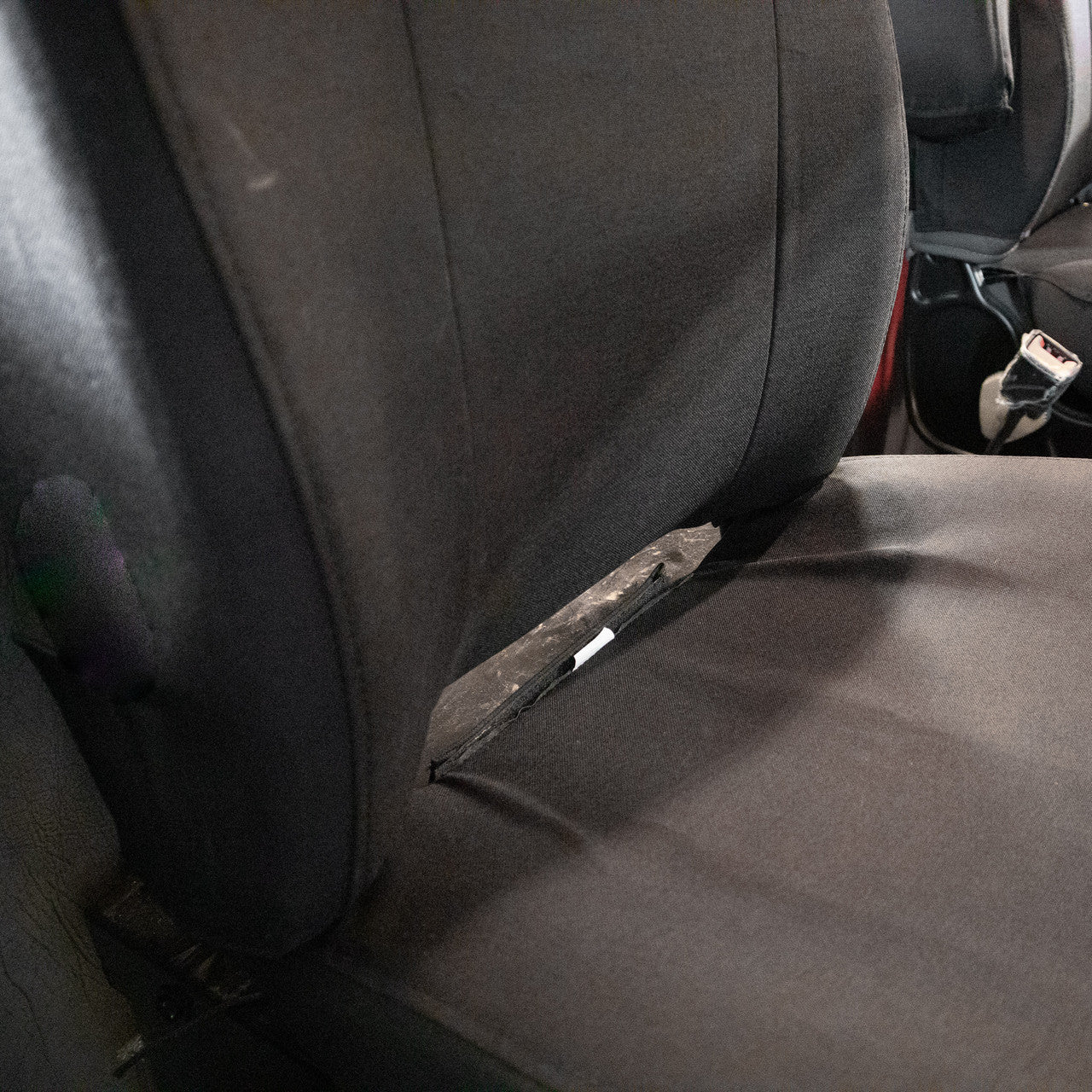 Kenworth passenger seat with TigerTough seat cover in black IronWeave