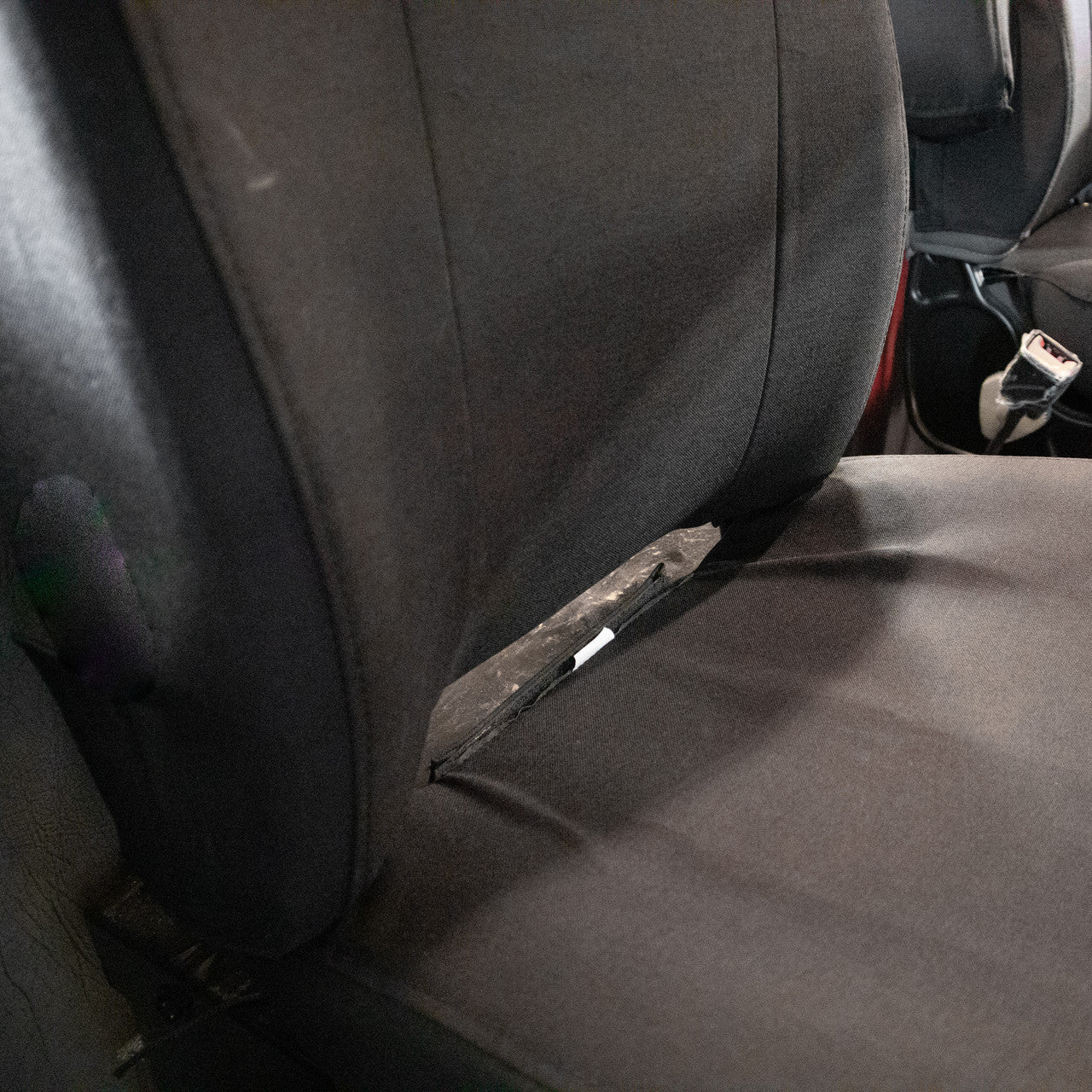 Kenworth passenger seat with TigerTough seat cover in black IronWeave