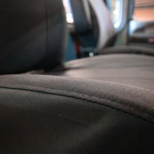 Kenworth passenger seat with TigerTough seat cover in black IronWeave