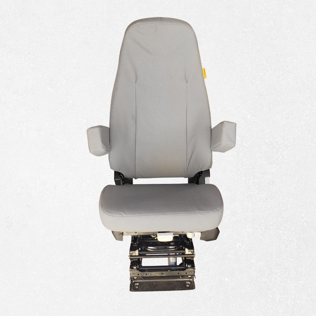 National Air Ride Seat with dual armrests and black Ironweave TigerTough Seat Covers
