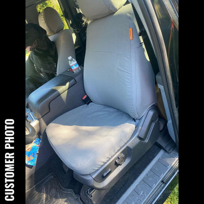 Ford Super Duty bucket seats with gray IronWeave TigerTough seat covers.