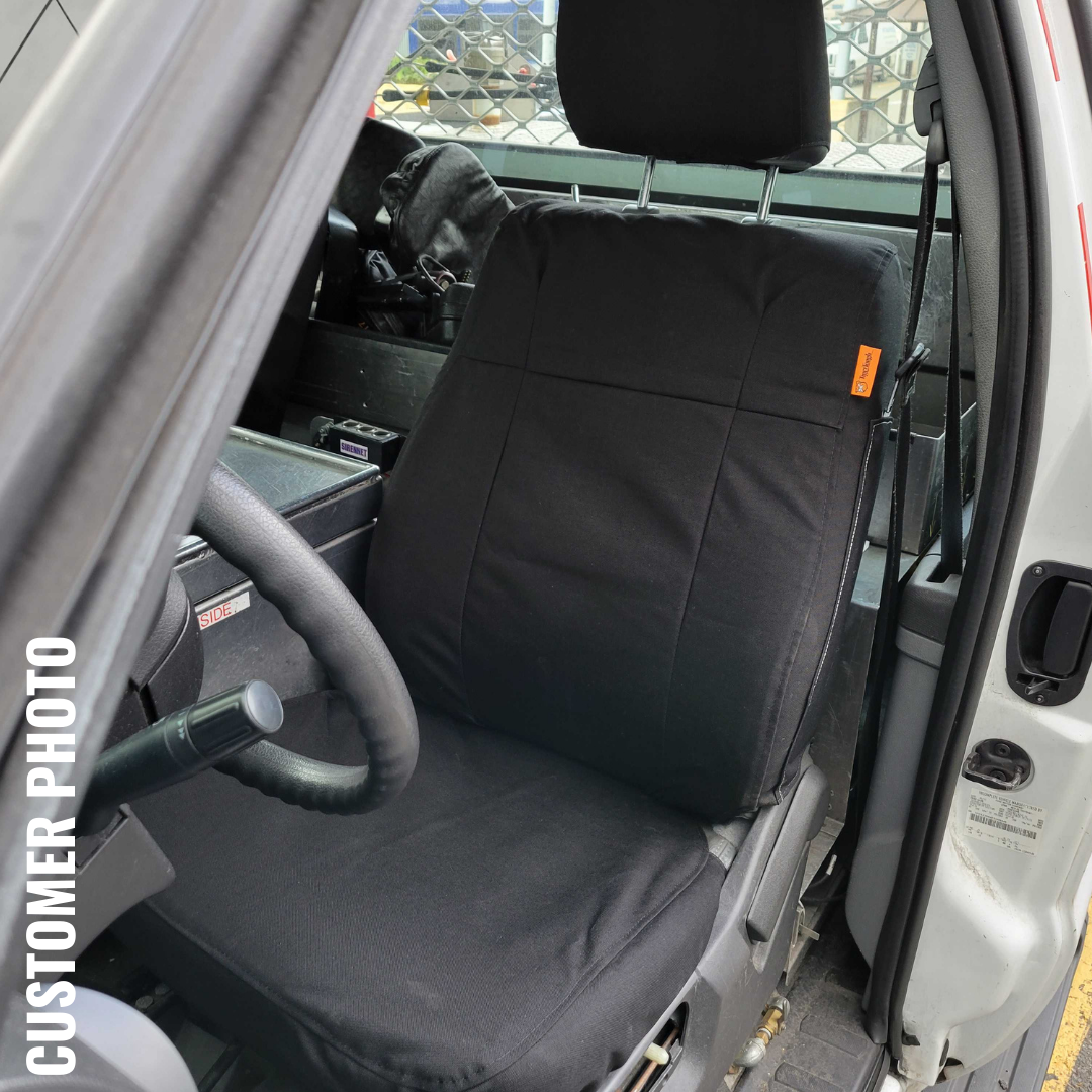 Ford Super Duty bucket seats with heavy duty black TigerTough seat covers .