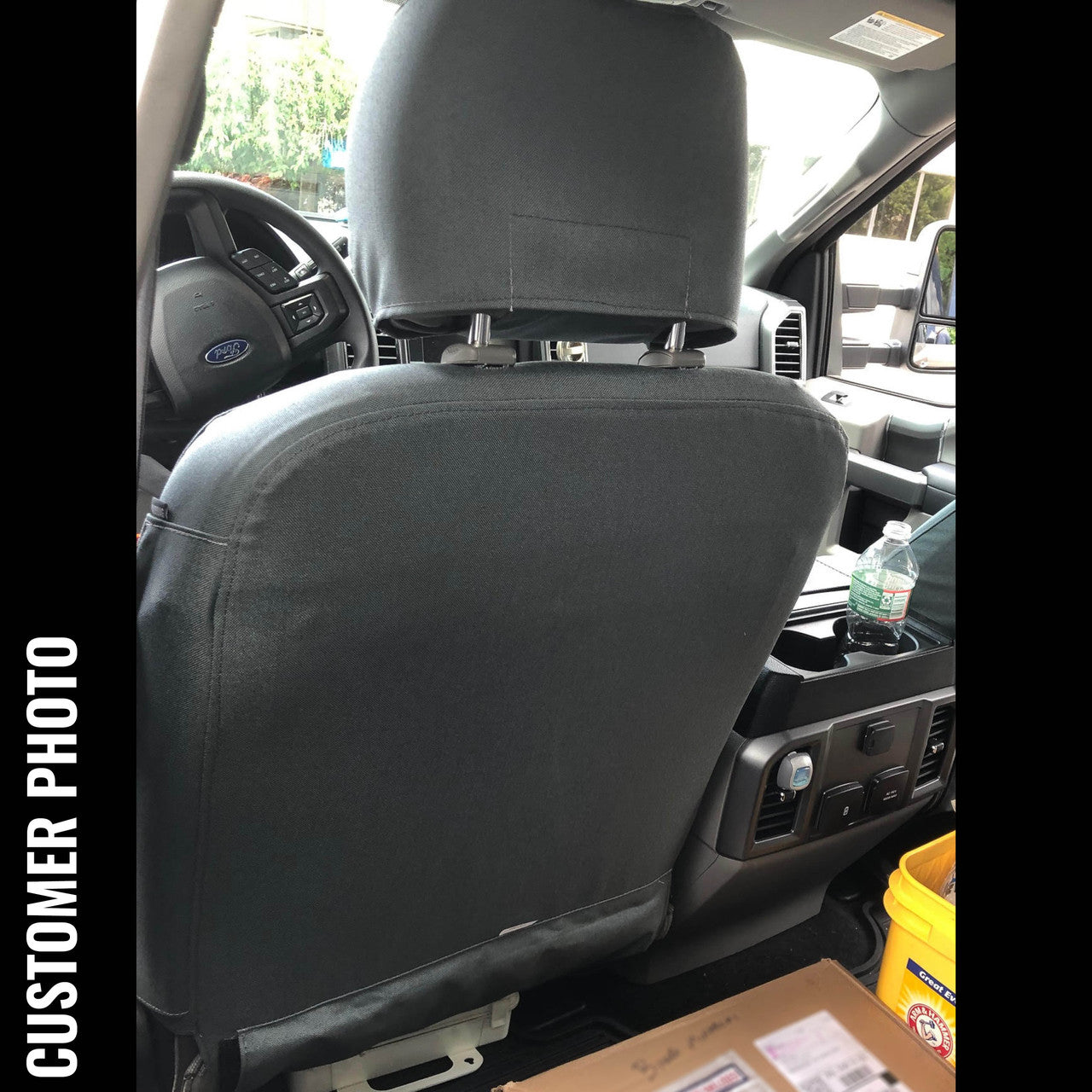 Ford Super Duty with gray TigerTough seat covers.