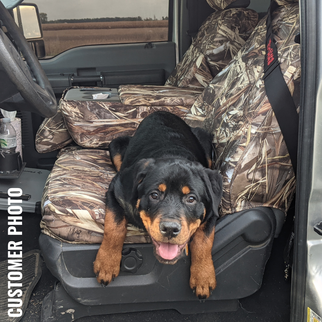 Ford Super Duty with camo custom fit TigerTough seat covers.