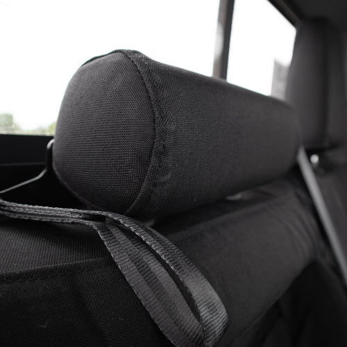 Closeup of Black Ironweave TigerTough seat covers on seat headrest