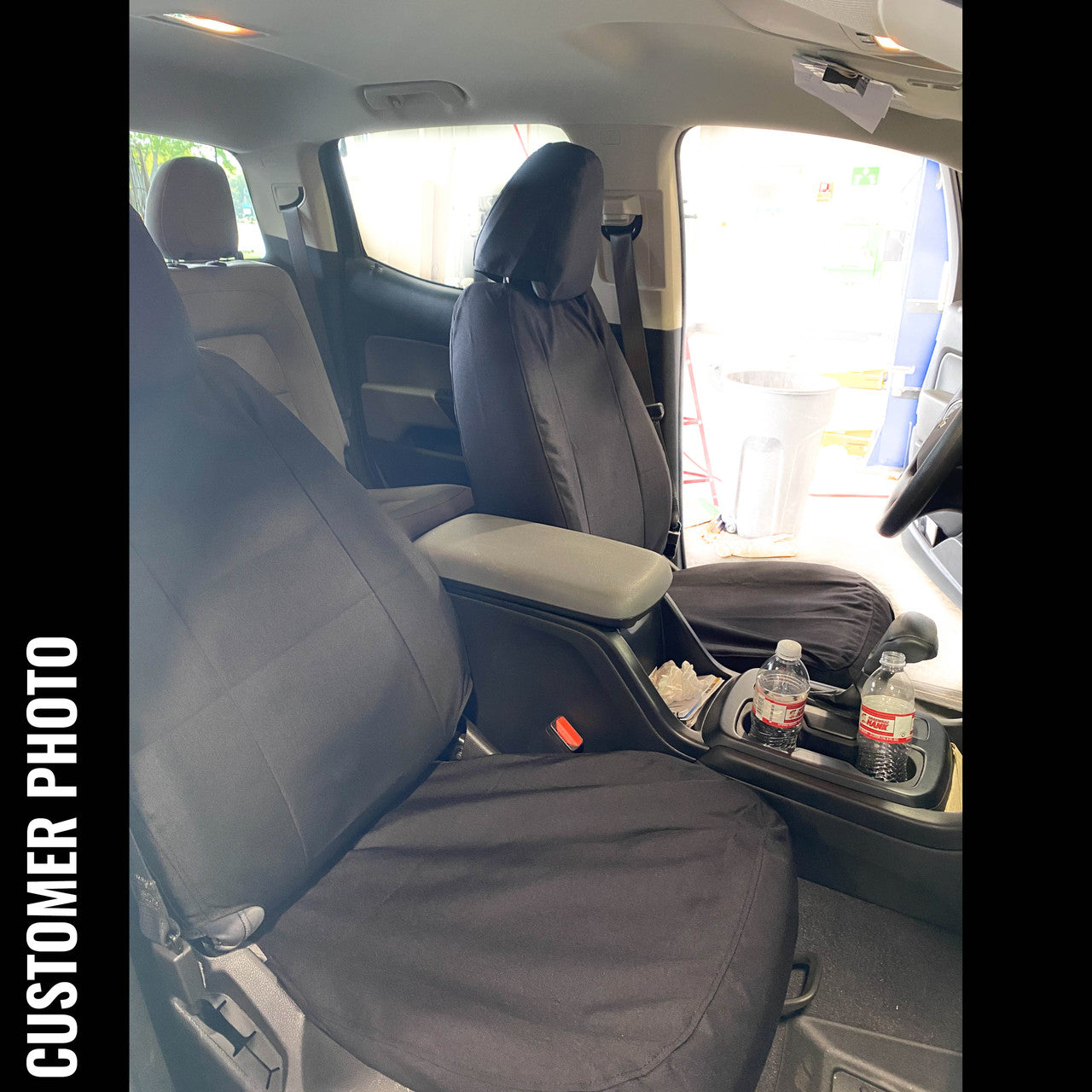 Chevy Colorado or GMC Canyon with TigerTough black custom fit waterproof seat covers.