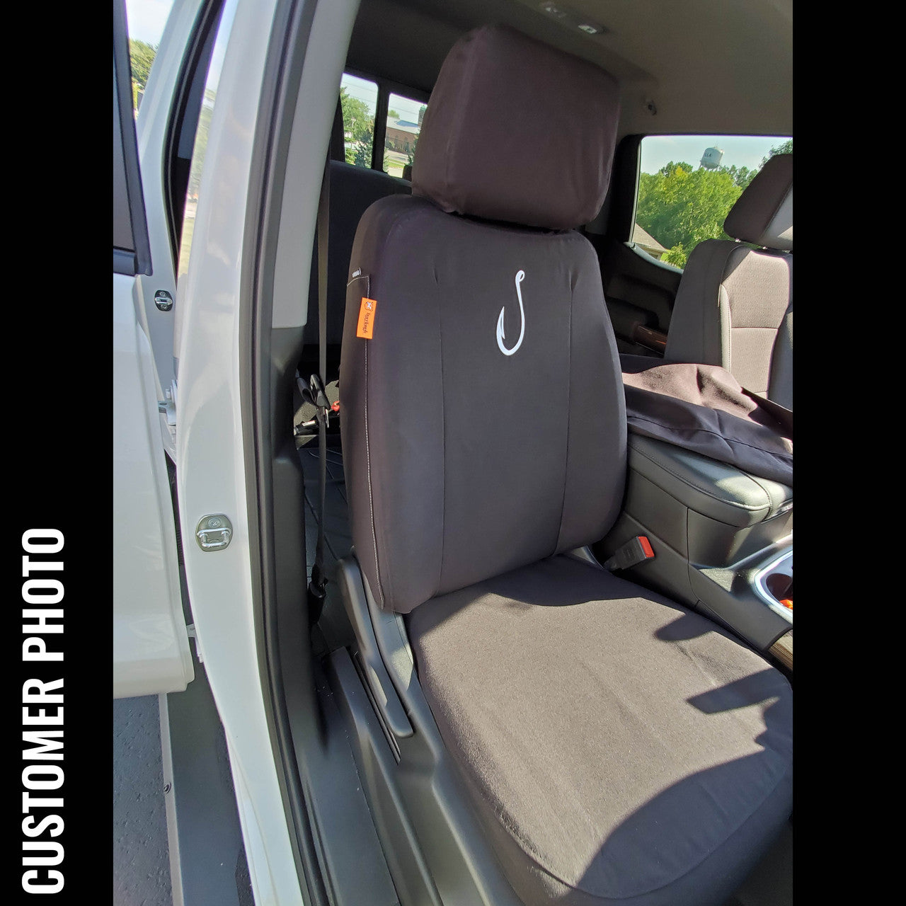 Front Seat of a 2019 Chevy Silverado 1500 with Black TigerTough Seat Covers