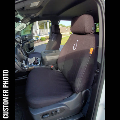 Front Seat of a 2019 Chevy Silverado 1500 with Black TigerTough Seat Covers