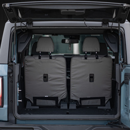 The seat covers work with the existing carseat restraint anchors