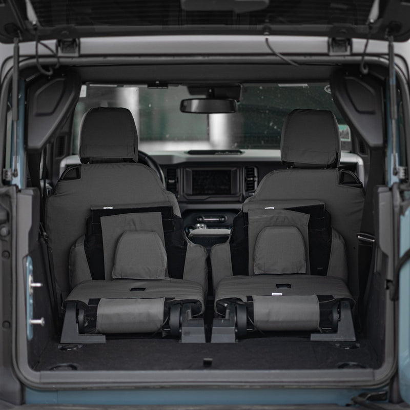 Photo of TigerTough Seat Covers on the Ford Bronco rear seat with the seats folded flat