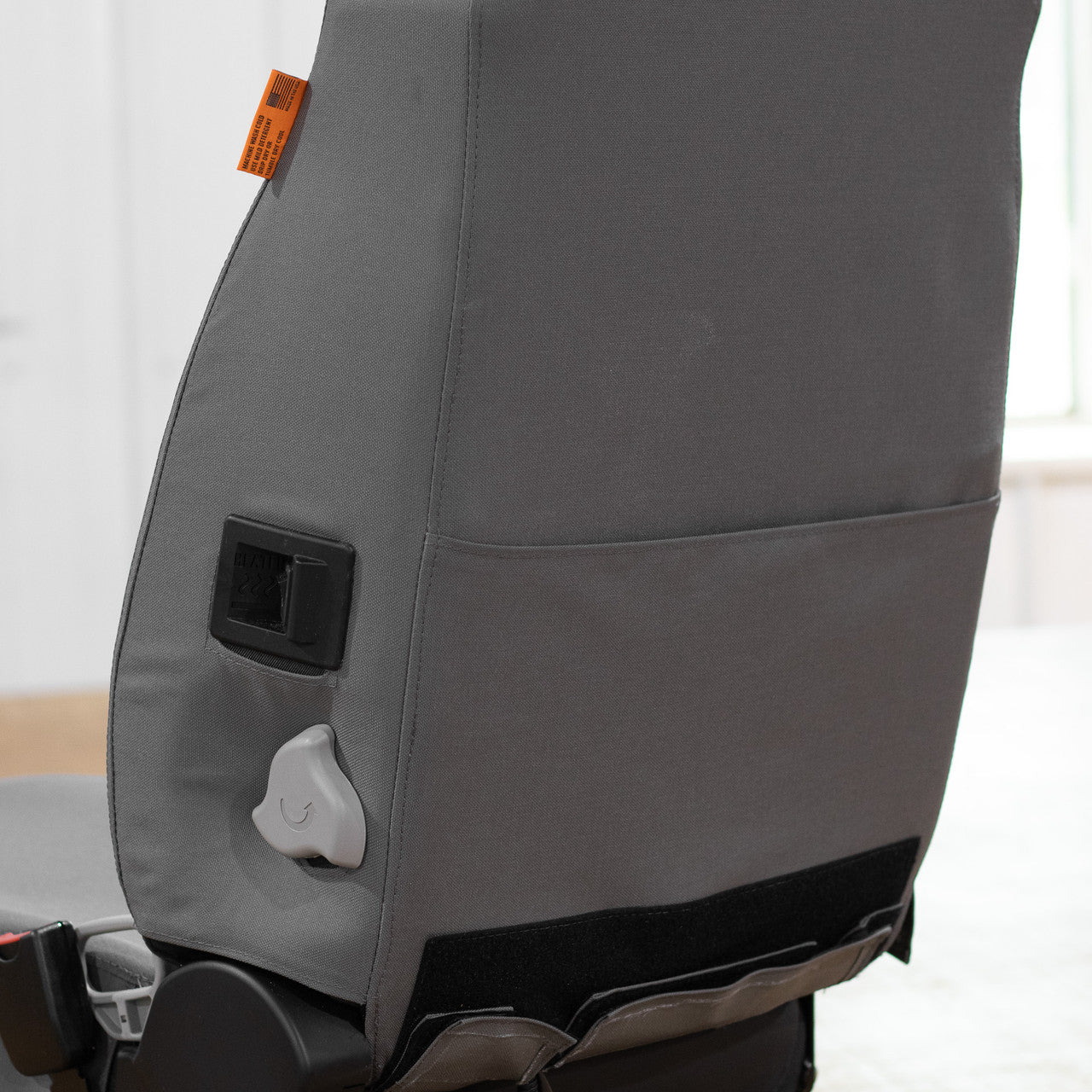 This Case & Link-Belt Excavator Seat Cover includes a pocket for the owner's manual