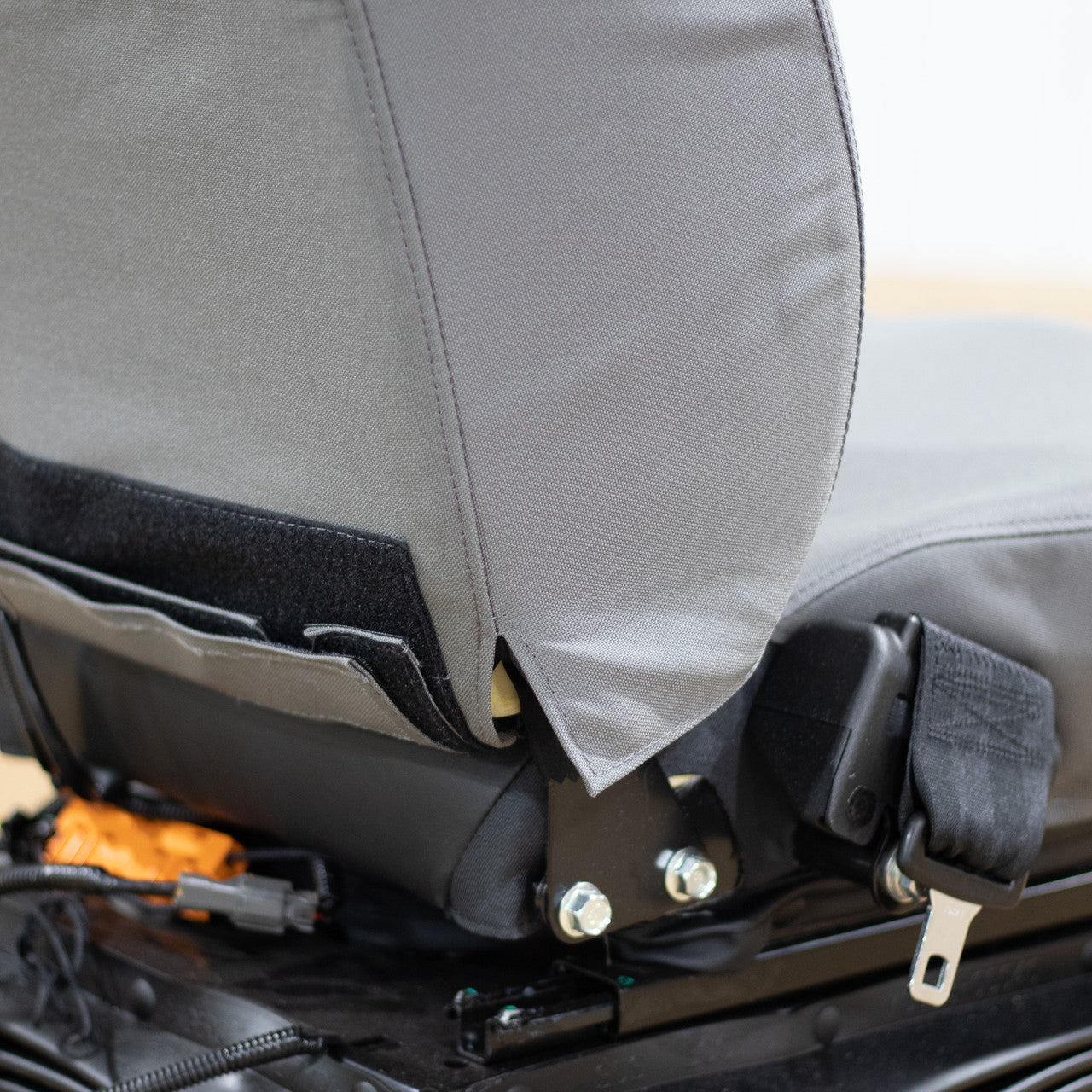 The Case & Link-Belt Excavator Seat Cover fits perfectly; fits tight with no shifting or bunching.