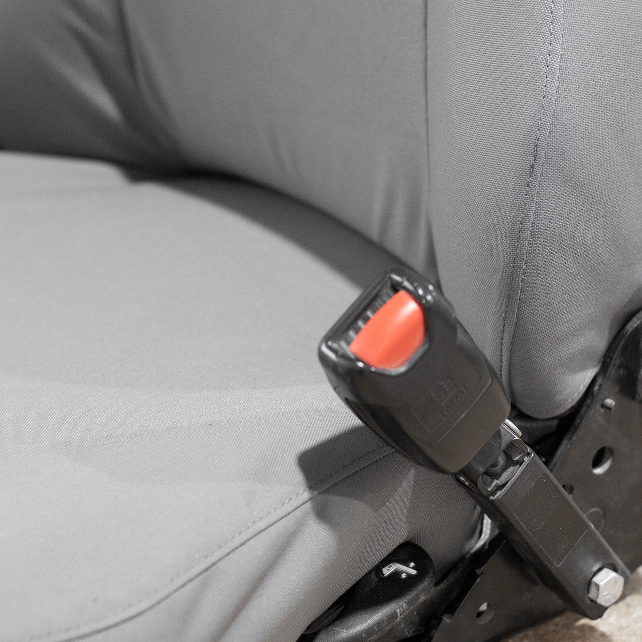 Closeup of the detail on the seat cover. Heavy equipment seat covers come with a lifetime warranty.