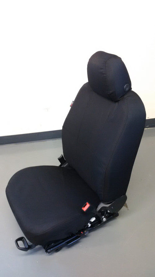Chevy police car seat with black TigerTough Tactical seat covers.