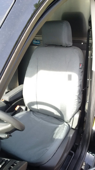 Ford Transit Connect with gray TigerTough seat covers.