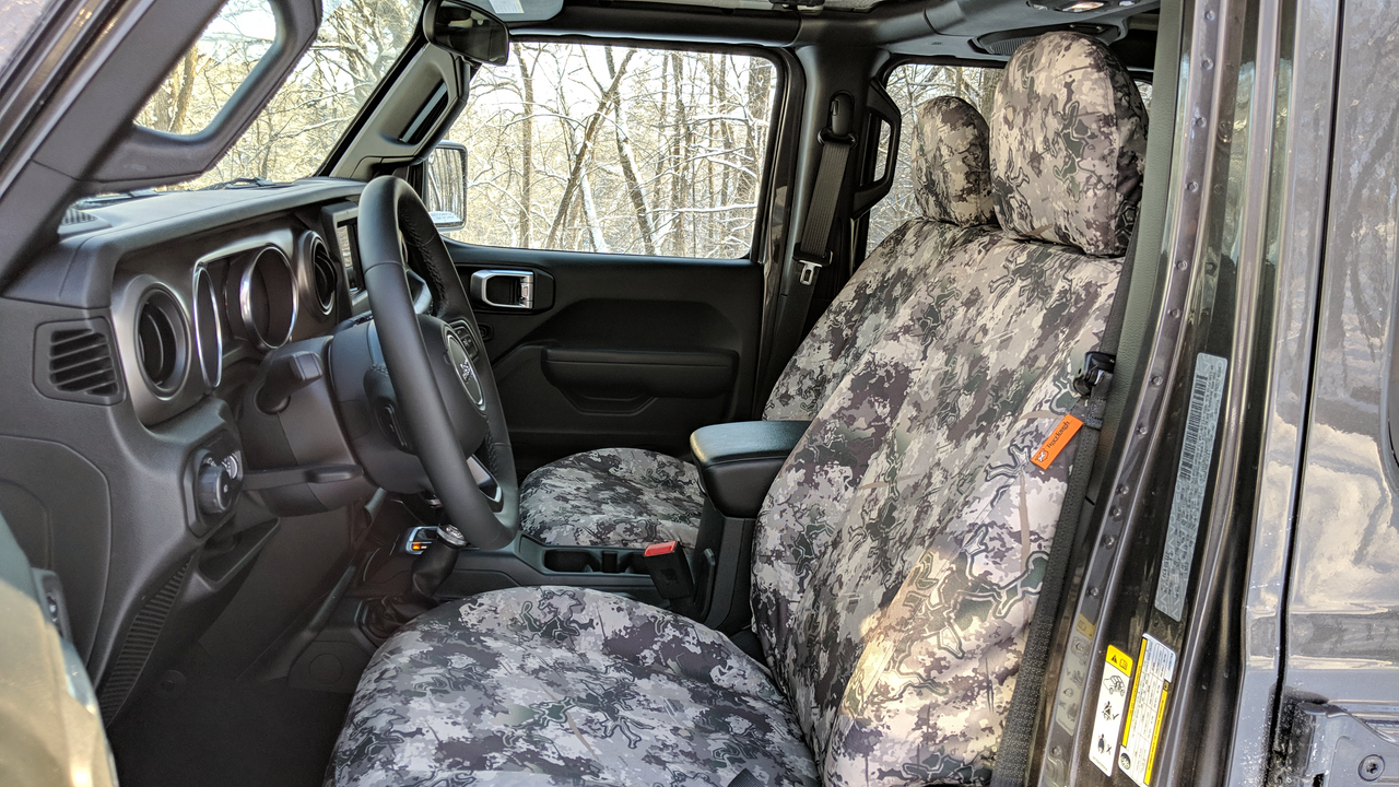 Jeep Wrangler JLU front seats with TigerTough seat covers in TrueTimber Western Viper.