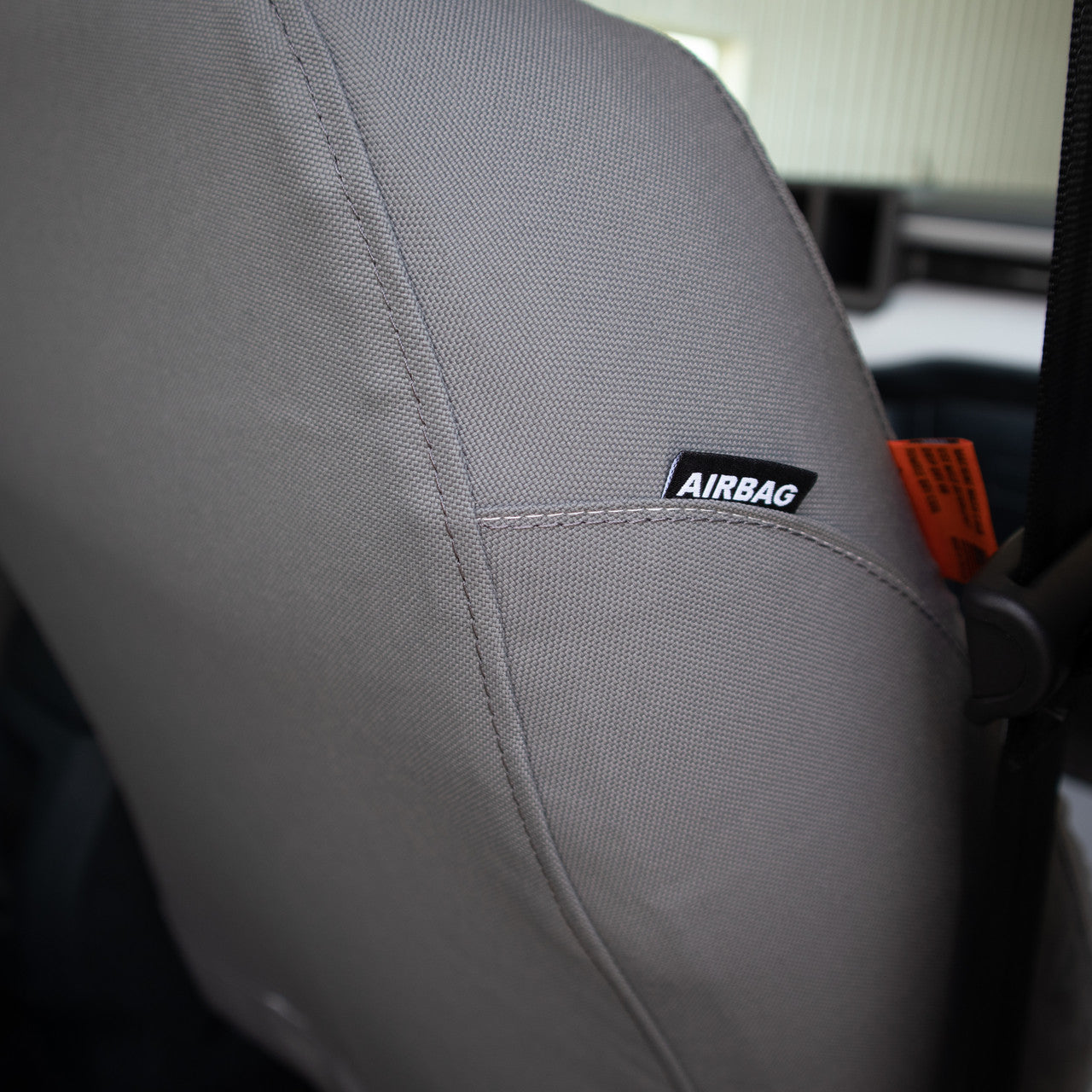 TigerTough Gray Ford Maverick Seat Covers - airbag compatible patch detail